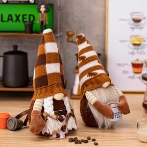 Detail of coffee gnome plush dolls with knitted texture and miniature coffee cup accessories