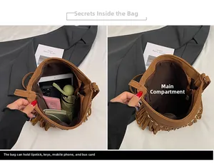 Detail of brown fringe handbag interior showing capacity for phone, keys and lipstick