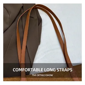 Détails du cabas en velours côtelé marron avec couture de bandoulière en cuir de qualité