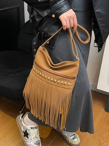 Brown large capacity tote bag with tassel fringe and studs in bohemian style