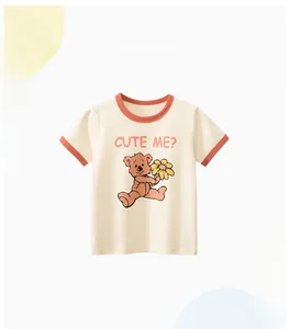 Close-up of cream kids T-shirt with orange trim and cute bear floral print