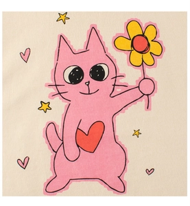 Detailed macro shot of a cute pink cartoon cat print on a beige cotton t-shirt fabric