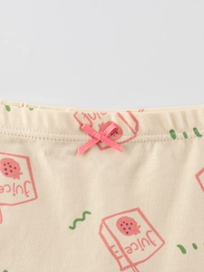 Girls' beige cotton boxers featuring strawberry juice print and a pink decorative bow detail