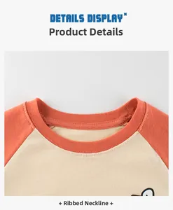 Détail du col en bord-côte sur un t-shirt enfant à manches raglan orange et beige