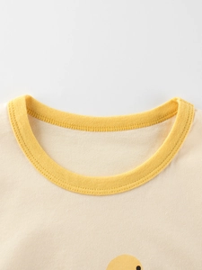 Short sleeve baby cotton T-shirt featuring yellow ribbed crew neck and cartoon print