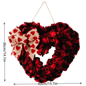 Detail view of red buffalo plaid heart wreath with burlap bow and size measurements