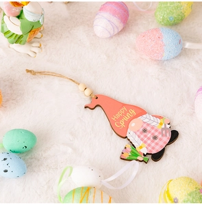 Detail of wooden Easter gnome pendant with Happy Spring text and hanging beads