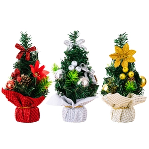 Three-piece set of mini Christmas trees with red, silver, and gold decorations on white