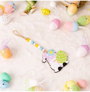 Easter gnome wooden hanging decoration with colorful beads and patterned egg detail