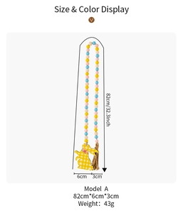 Detailed view of Easter wood bead garland with yellow plaid bunny and jute tassel