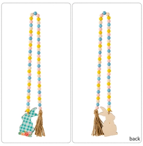 Detail of Easter bead garland featuring colorful wood beads and bunny tag front and back