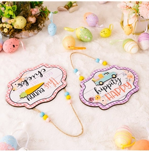 Close-up of Easter wooden signs with plaid borders, colorful beads and festive bunny graphics