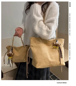 Two-piece khaki suede tote bags with metal chain straps and cute bear charm details
