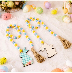 Easter bead garland with pastel wooden beads, jute tassels, and rabbit wooden pendants