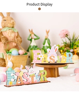 Detailed view of 3D layered wooden Easter letter signs with bunny and egg motifs
