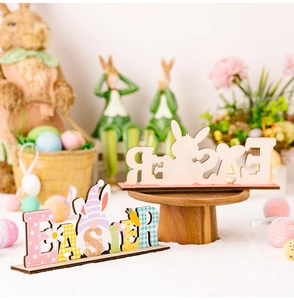 Detailed view of wooden Easter letter sign with colorful patterns and gnome figure