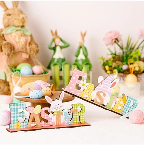 Easter wooden letter ornaments with colorful rabbits and gnomes for tabletop decor