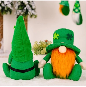 Detail of St. Patrick's Day gnomes with green shamrock hat and fuzzy orange beard decor