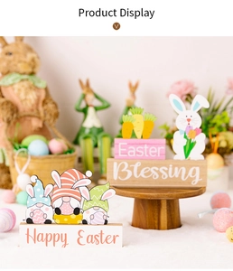 Close-up of Easter gnomes and bunny wooden tabletop signs with Happy Easter text