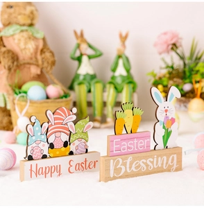 Easter tabletop wood gnomes with Happy Easter signs and white rabbit holding tulips