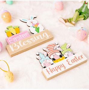 Easter wooden desk ornaments featuring colorful gnomes and bunnies on a fuzzy white surface