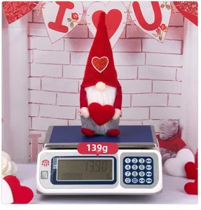 Detailed view of Valentine's gnome weight on scale showing approximately 139g
