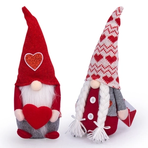 Set of two Valentine's Day gnomes with red heart knit hats and white braids decor