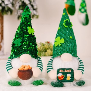 Detail of two St. Patrick's Day gnomes with green sequins, gold coins, and Irish sign