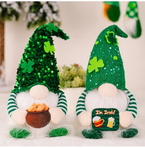 Detail of St. Patrick's Day gnomes with green sequins, gold coin pot and Irish sign