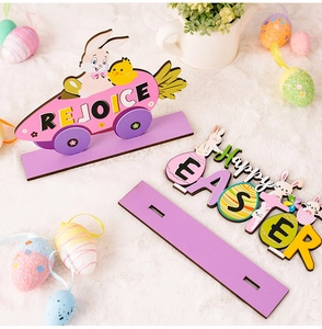 Detail of wooden Easter Happy Easter signs and purple rabbit carrot car table decor