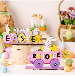 Detail of wooden Happy Easter desktop ornaments with rabbit and carrot racing car design