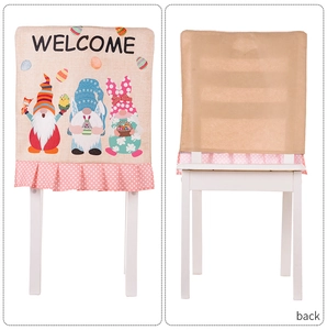 Detailed view of burlap Easter chair covers with gnome prints and pink polka dot ruffles
