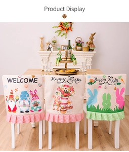 Detail of linen Easter chair covers with rabbit prints and pink polka dot ruffle trim