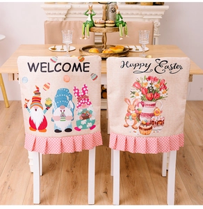 Detail of Easter gnome and bunny chair covers with pink polka dot ruffled skirts