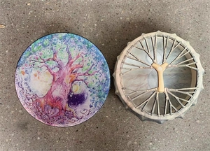 Detail of Shaman drum with Love Tree art and wooden Y-shaped handle on the back