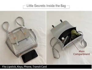 Detail of silver tweed backpack interior showing main compartment and storage capacity