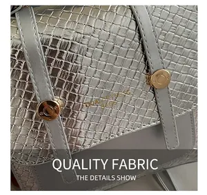 Detail of silver woven texture and gold rivets on the stylish metallic backpack