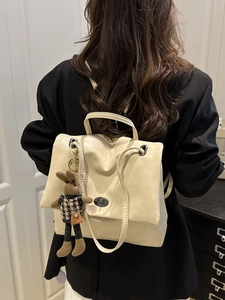 Elegant cream white PU leather backpack for women with cute rabbit doll charm