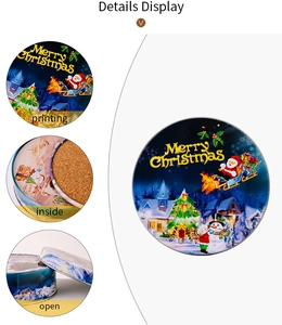 Detail display of Christmas tinplate box showing printed patterns and inner cork lining