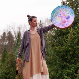 Artistic Shamanic drum featuring a colorful Tree of Life design with a wooden mallet