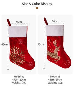 Detail of red Christmas stockings with white fur trim and golden sequin deer snowflake patterns