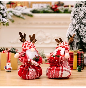 Christmas gnome gift bags with reindeer antlers and festive pine branch decorations