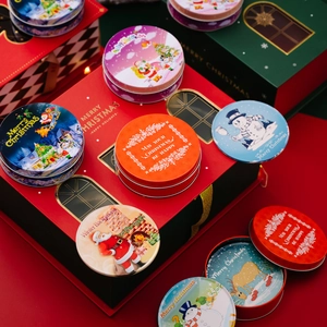 Christmas tinplate gift boxes with festive reindeer and Santa Claus printed designs