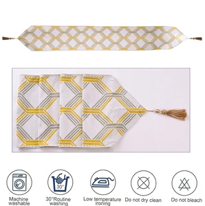 Detailed view of modern table runner with geometric honeycomb pattern and tassel fringe