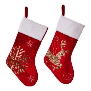 Red velvet Christmas stockings with white faux fur trim, sequined snowflake and reindeer