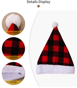 Detail view of red and black buffalo plaid Christmas hat with plush fur and soft hairball