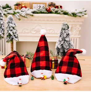 Red and black plaid Christmas hat set with plush trim and miniature festive dolls