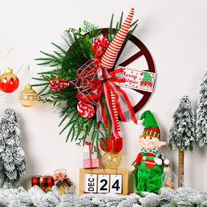 Detailed Christmas wheel wreath with festive elf legs and pine branches on white background