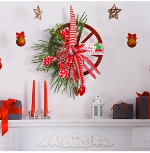 Detailed Christmas wreath featuring elf elements, red bow, and Merry Christmas sign