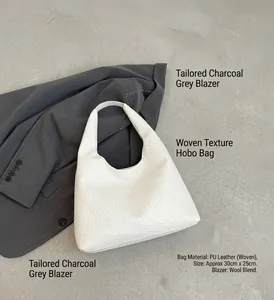 Detail of white woven texture on a large capacity hobo tote bag for daily commuting